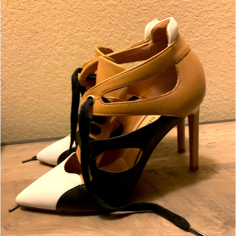 Brown and white heels